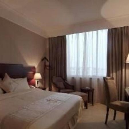 Qingdao Royal Garden Hotel Екстер'єр фото