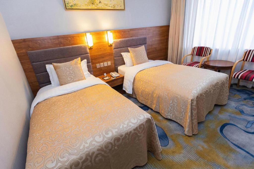 Qingdao Royal Garden Hotel Екстер'єр фото