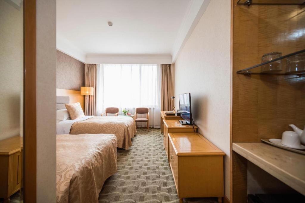 Qingdao Royal Garden Hotel Екстер'єр фото