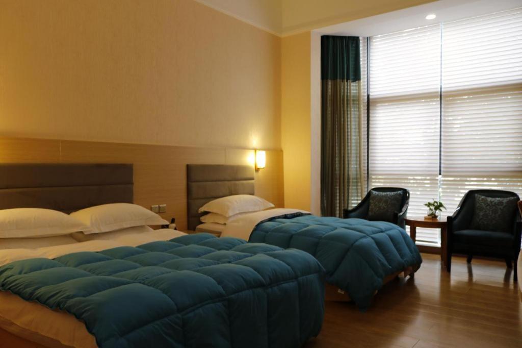 Qingdao Royal Garden Hotel Екстер'єр фото
